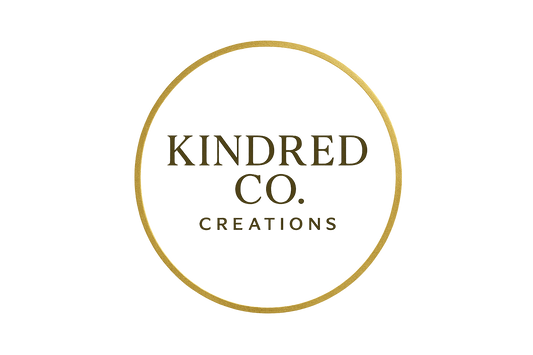 KINDRED CO. CREATIONS WITH A GOLD CIRCLE AROUND IT